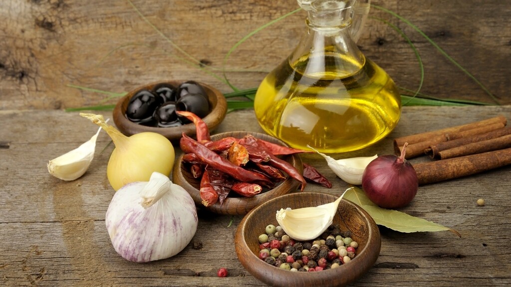 Organized Olive oil bottles and spices