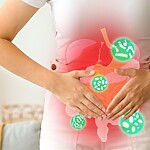 5 Probiotic Myths I Wish I Knew Before My Gut Went Rogue Person holding their stomach with a glowing digestive system graphic overlay.