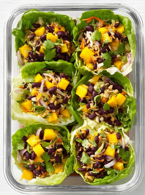Meal Prep Black Bean and Mango Salad - lettuce cups arranged in a storage container with bean and mango filling ready for lunch