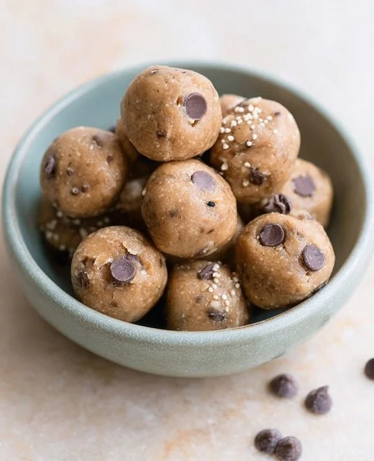 Cinnamon-Almond Peanut Butter Protein Bites — lightly dusted with cinnamon