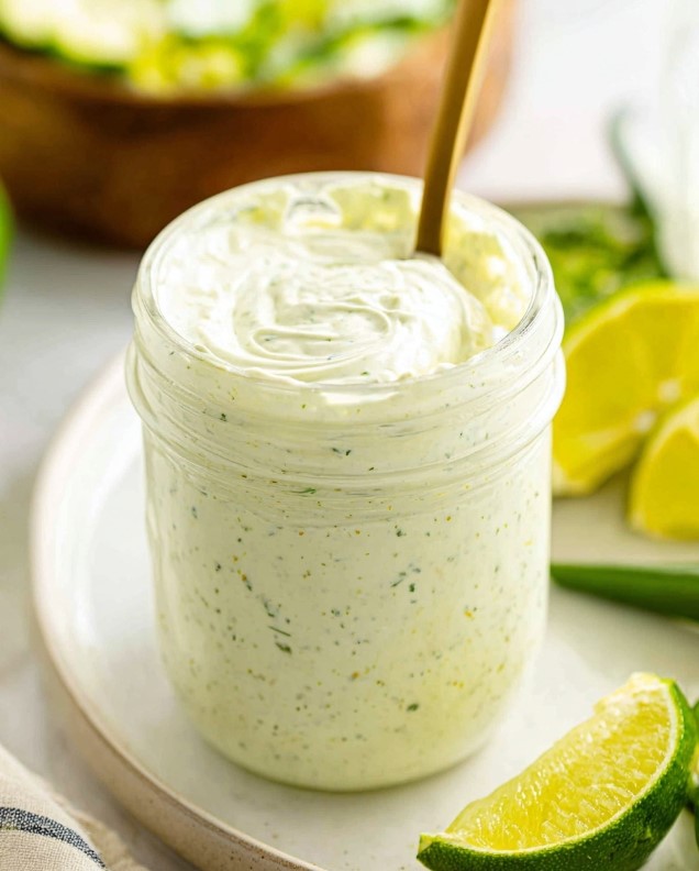 Low-Carb Cilantro Lime Dressing - creamy green sauce blended to perfection and stored in a glass jar, ready for salads or dipping